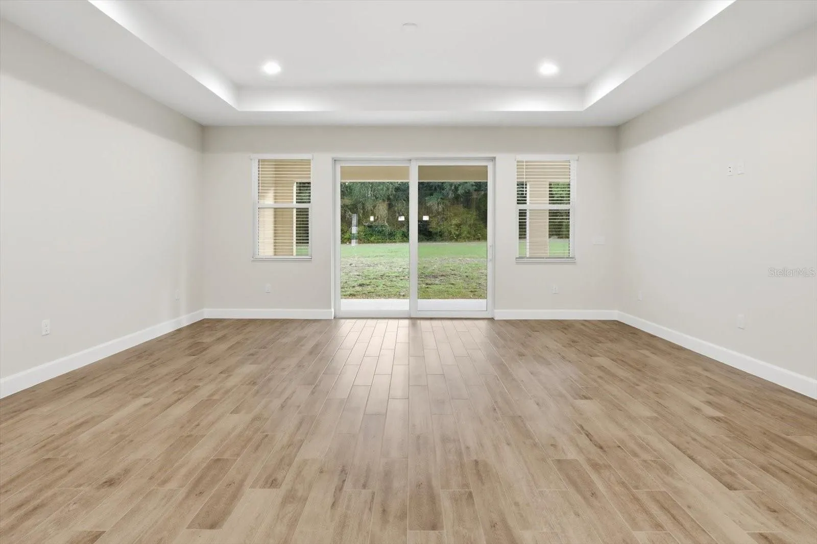 Tile plank flooring throughout the main living areas.