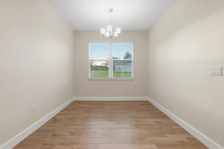 Interior Laundry room. Washer and electric dryer hookups.