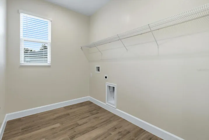Interior Laundry room. Washer and electric dryer hookups.