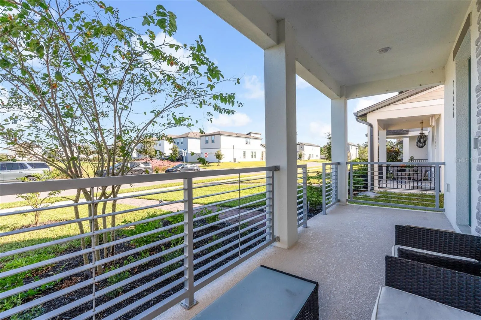 Covered front porch overlooking the neighborhood