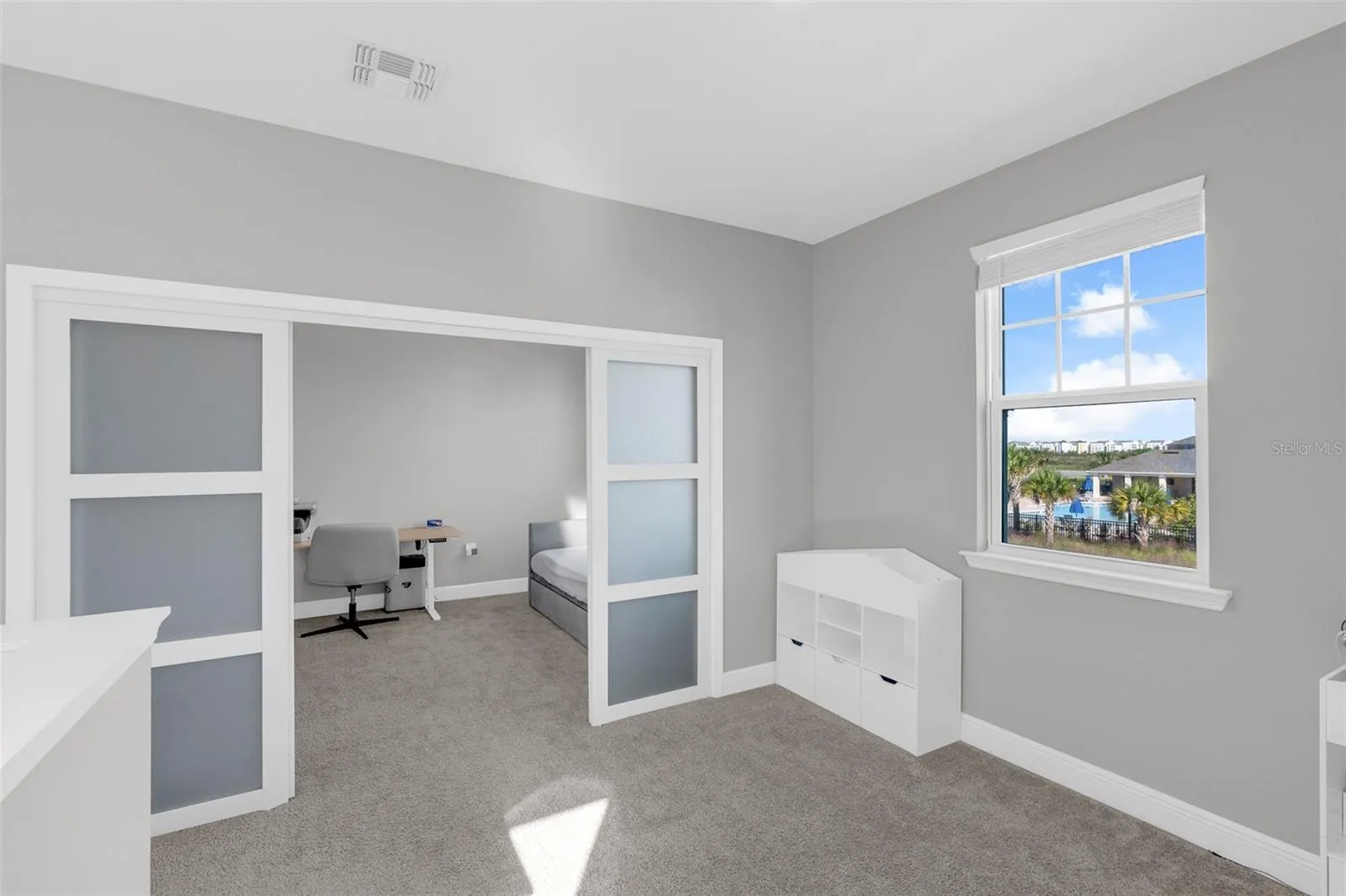 Versatile upstairs loft with sliding doors