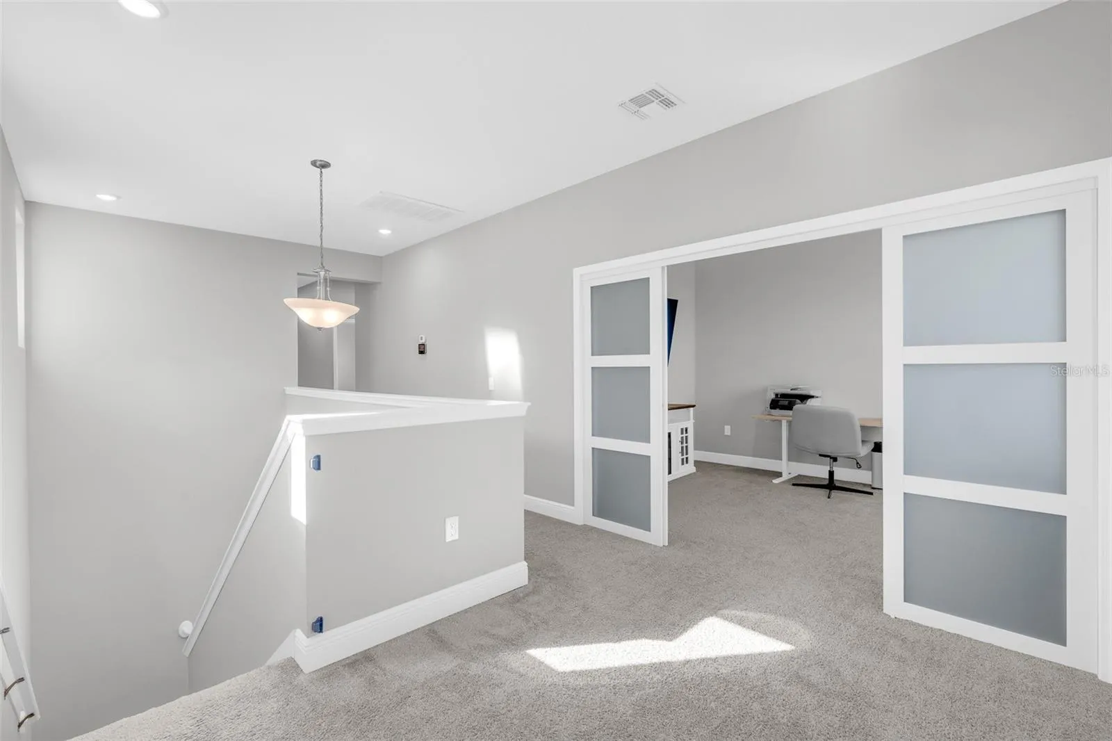 Upstairs loft offering flexible living space