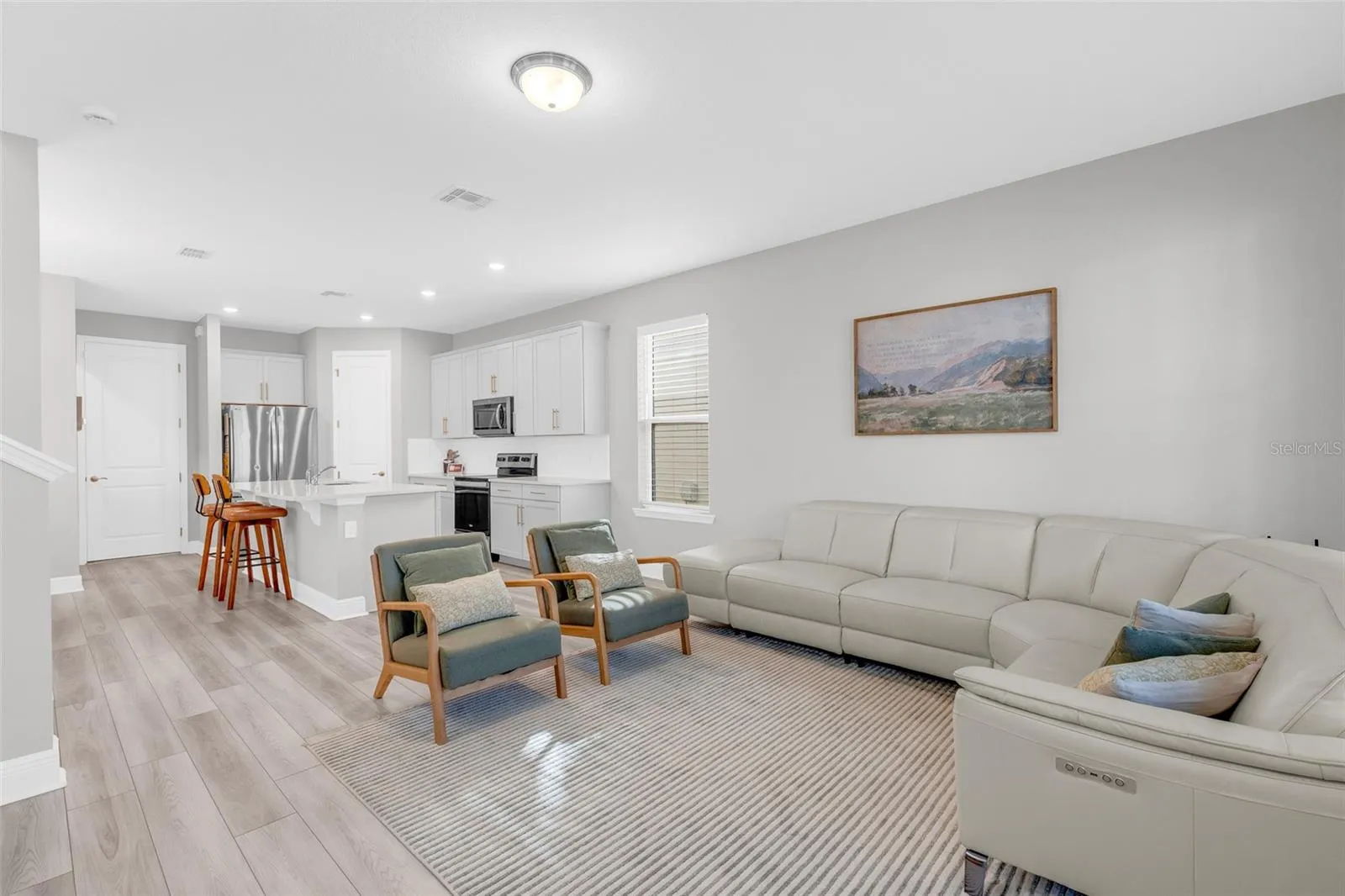 Living room with an open layout and natural light