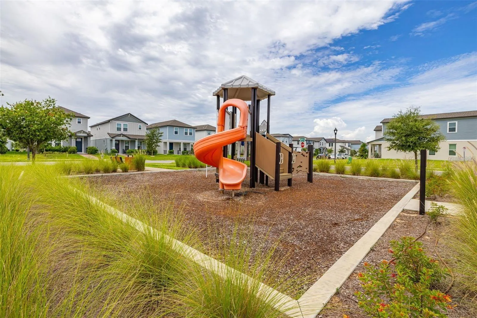 Community playground with slides and climbing features.