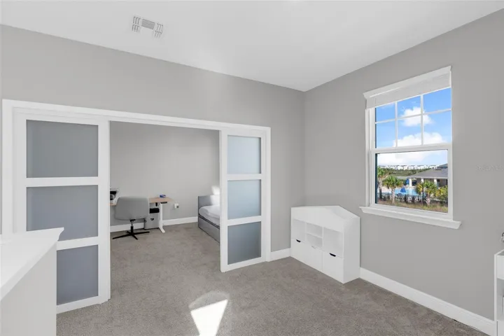 Versatile upstairs loft with sliding doors