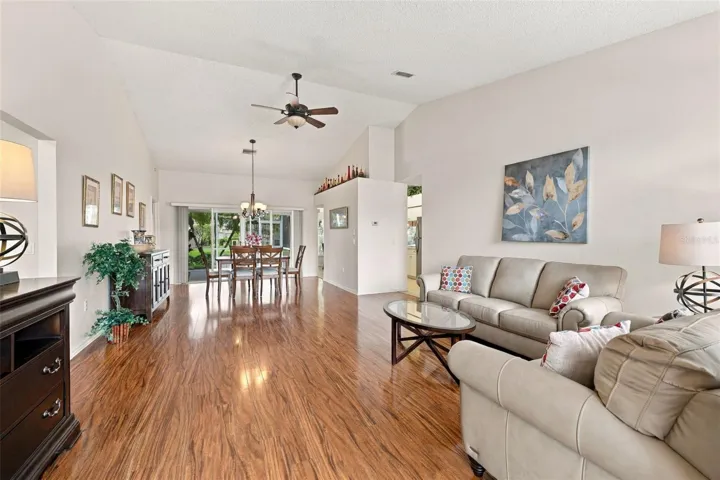 View as you enter the home with vaulted ceilings looking straight to the lanai