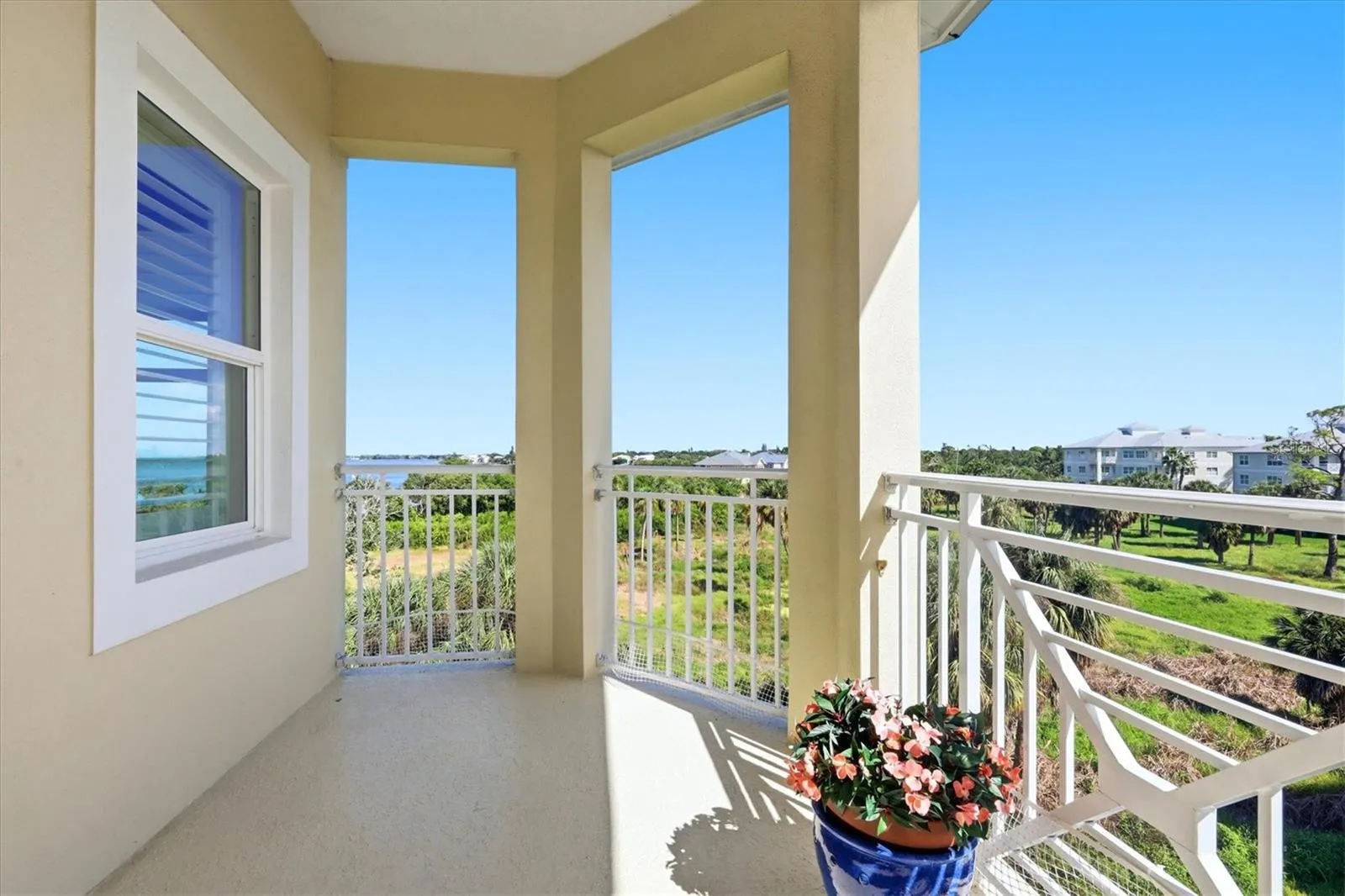 Balcony off the living room with bay view.