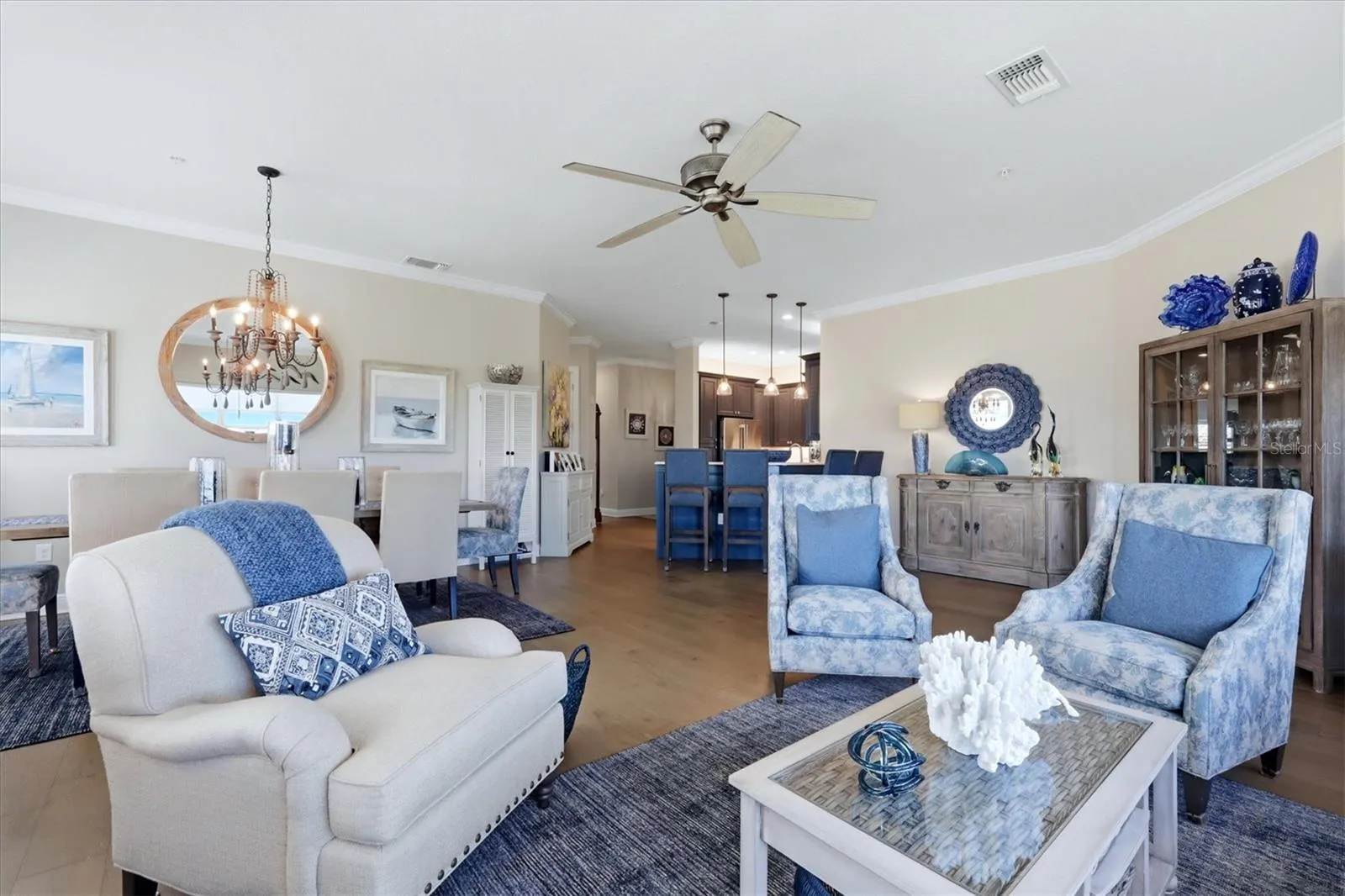 Living room has gorgeous hardwood floors.