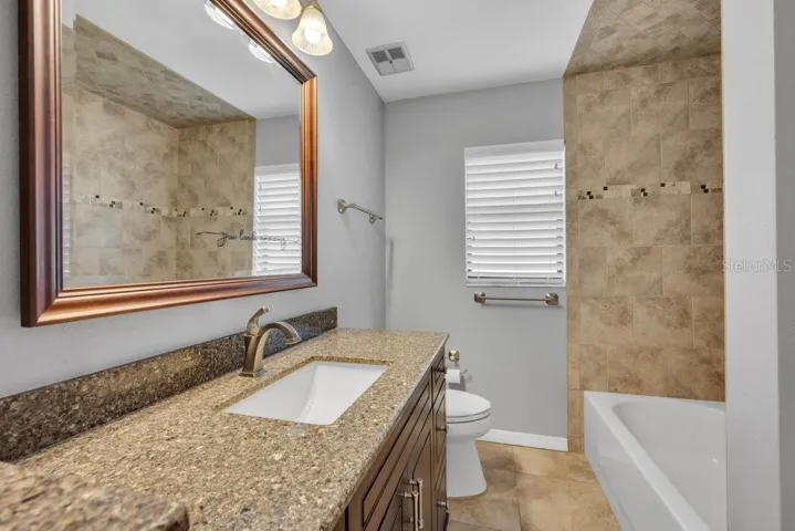 Bathroom 2 with tub and shower