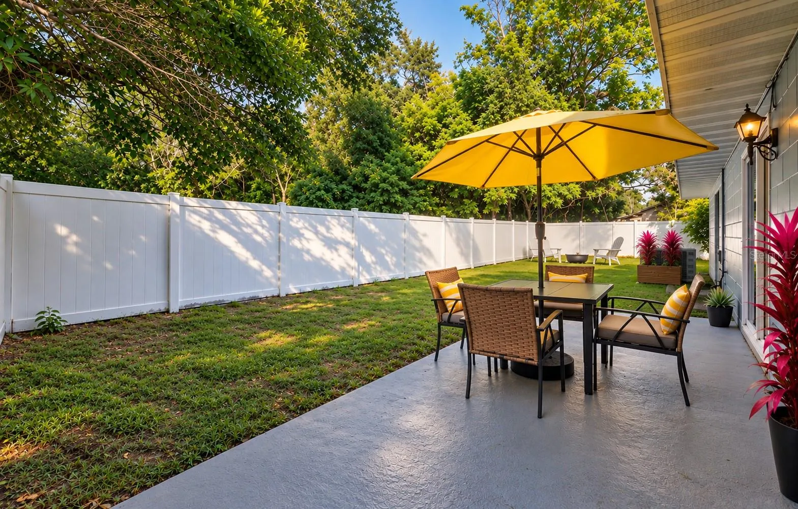 Enjoy the mature landscaping and new vinyl fence in the spacious back yard!