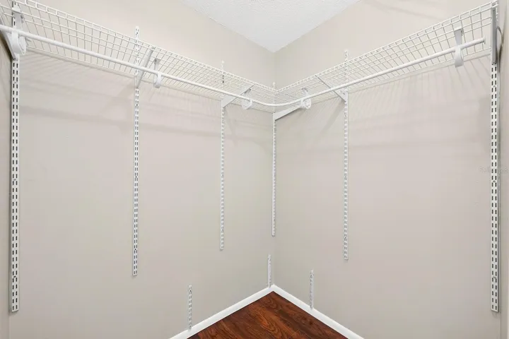 The spacious walk-in closet in the Primary Suite