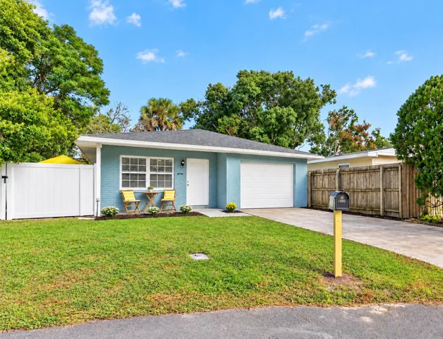 Welcome to this charming 2-bedroom, 2-bath single-story home in HIBISCUS WOODS, where peaceful surroundings and thoughtful updates come together!