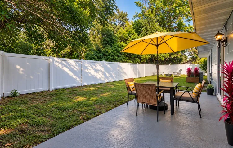 Enjoy the mature landscaping and new vinyl fence in the spacious back yard!