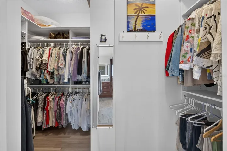Walk-in closet with built-ins.