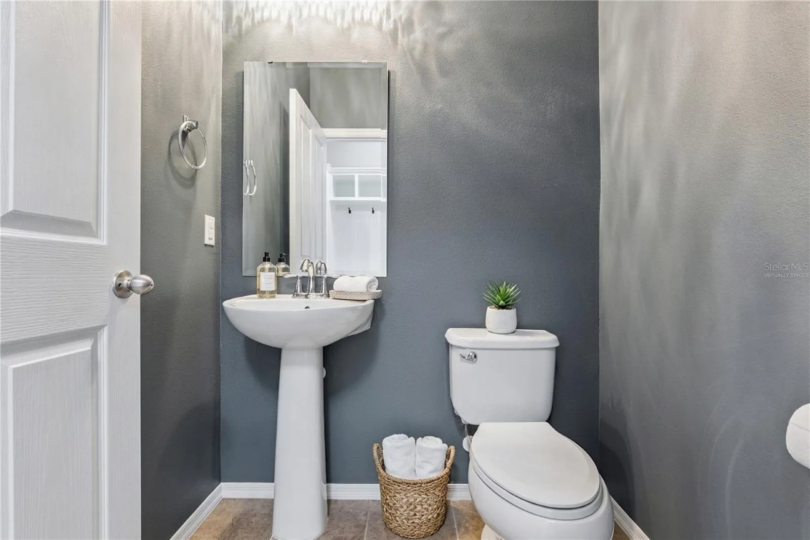 Virtually Staged. 1st floor half bath