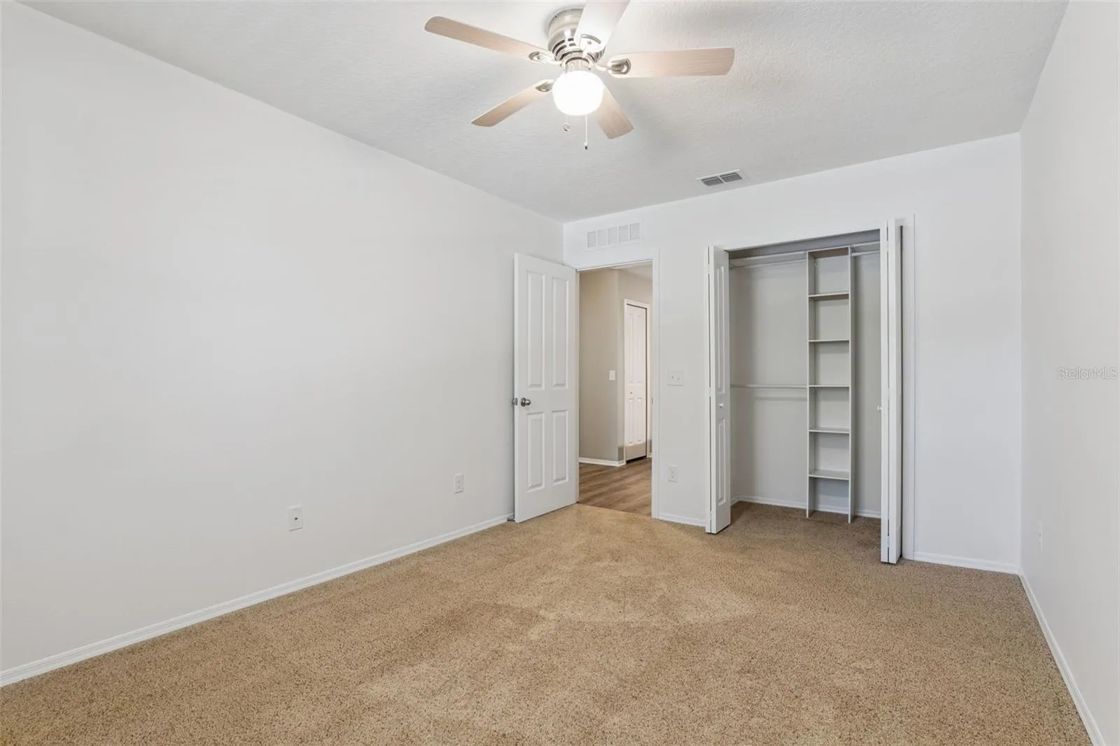 Bedroom 3 (10' x 13') featuring built in closet