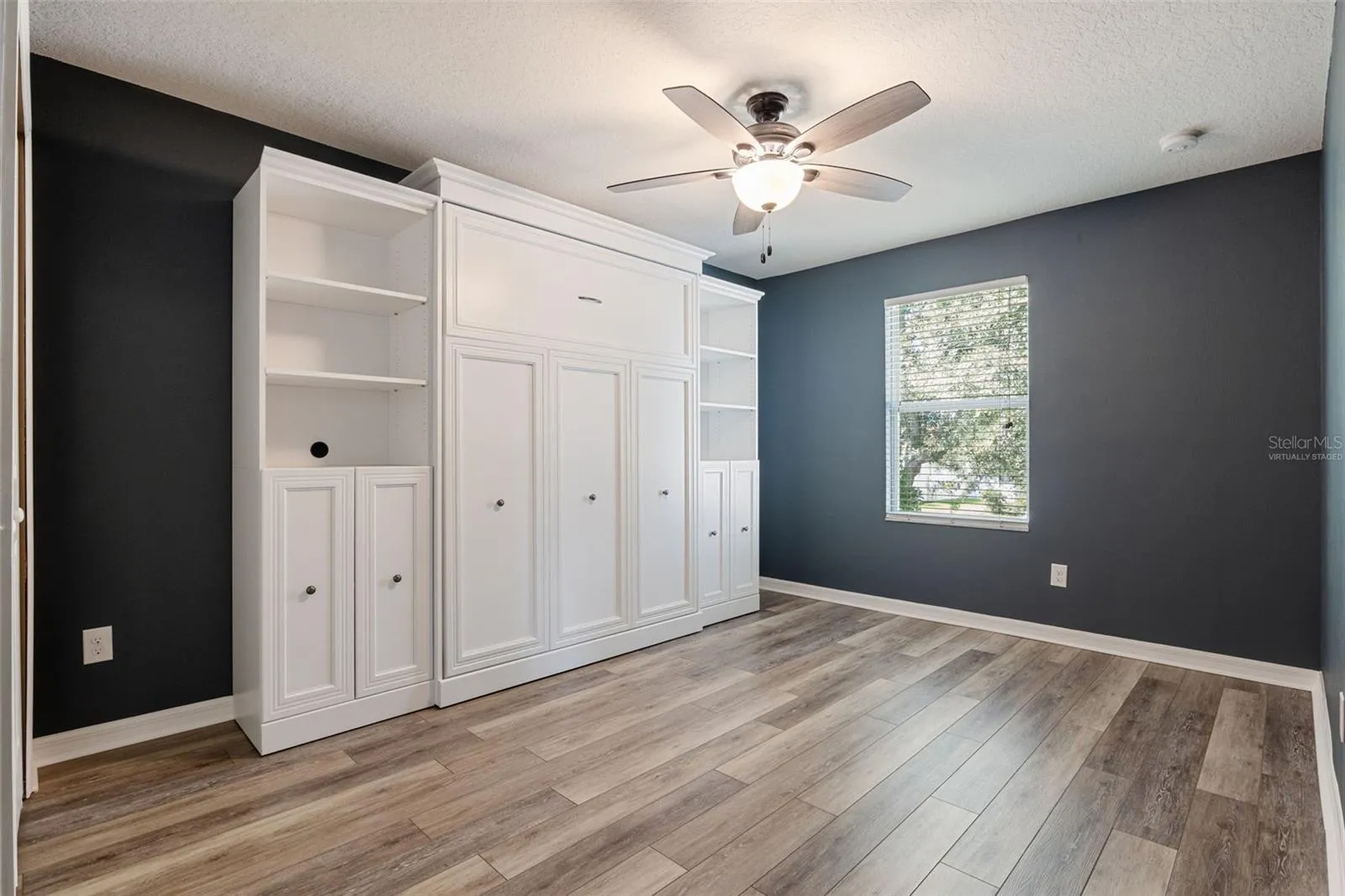 Virtually staged. Laundry room