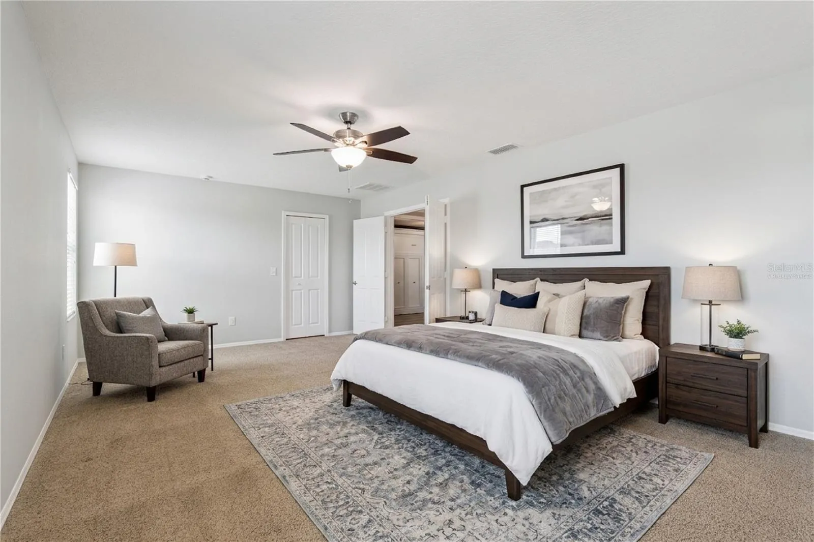Virtually staged primary suite