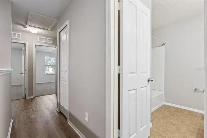 2nd floor hallway leading to bedroom 2 & 3 and bathroom