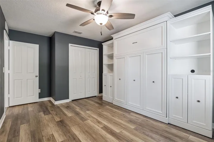 Bedroom 4 (10' x 15') with built-in murphy bed