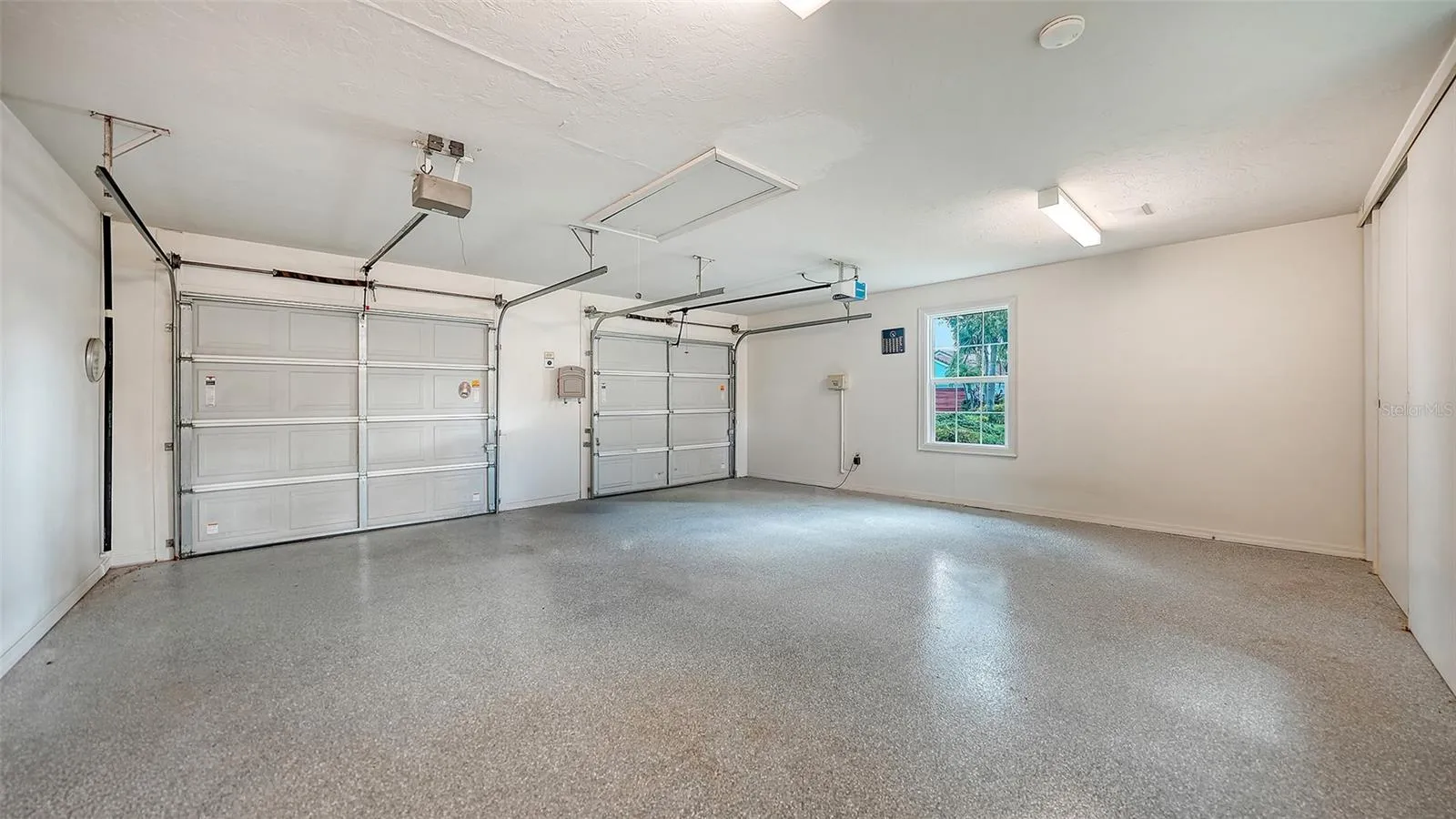 Over-Sized 2-Car Garage with Electric Charging Station