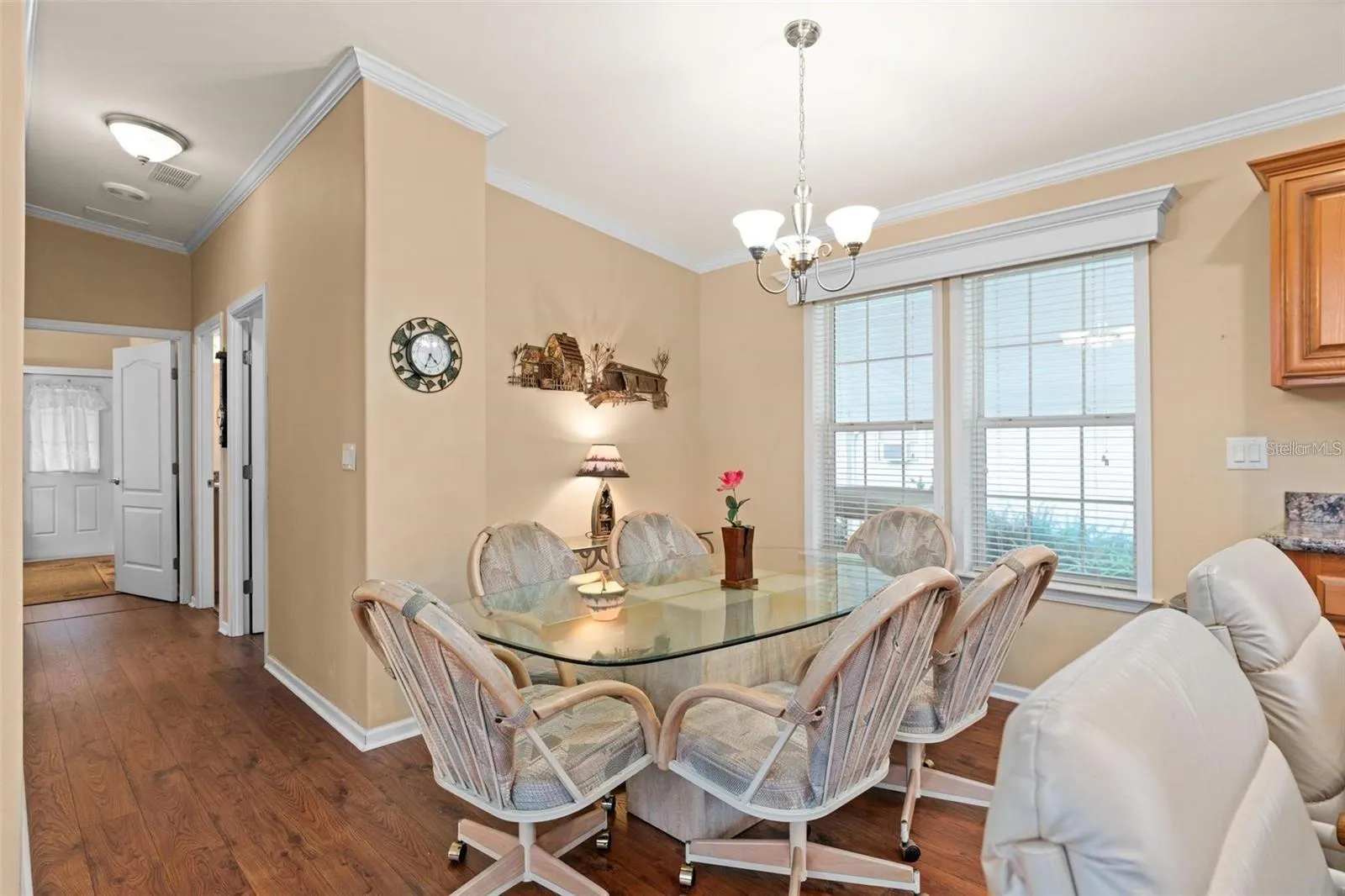 Bright dining room adjacent to kitchen