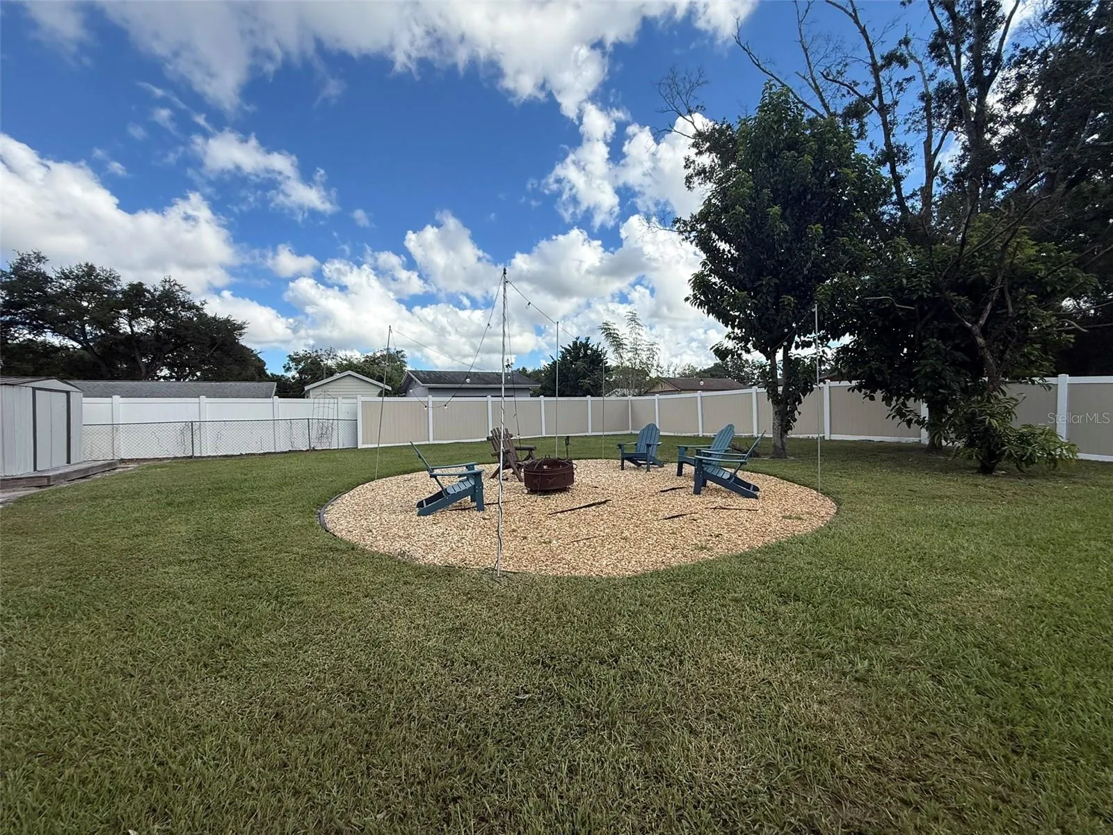 Fenced in backyard gathering Area