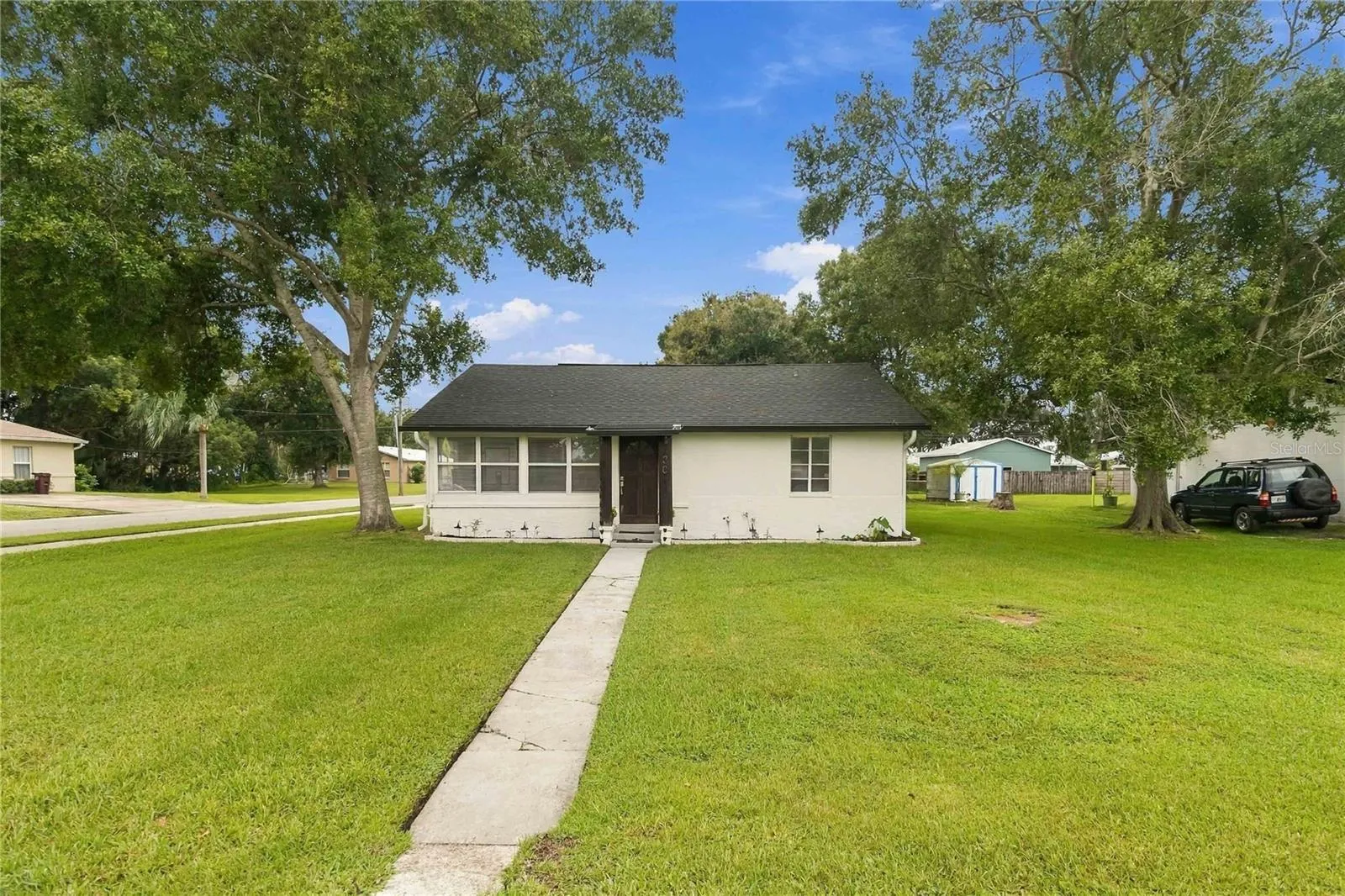 This charming home sits on a shaded, corner lot.