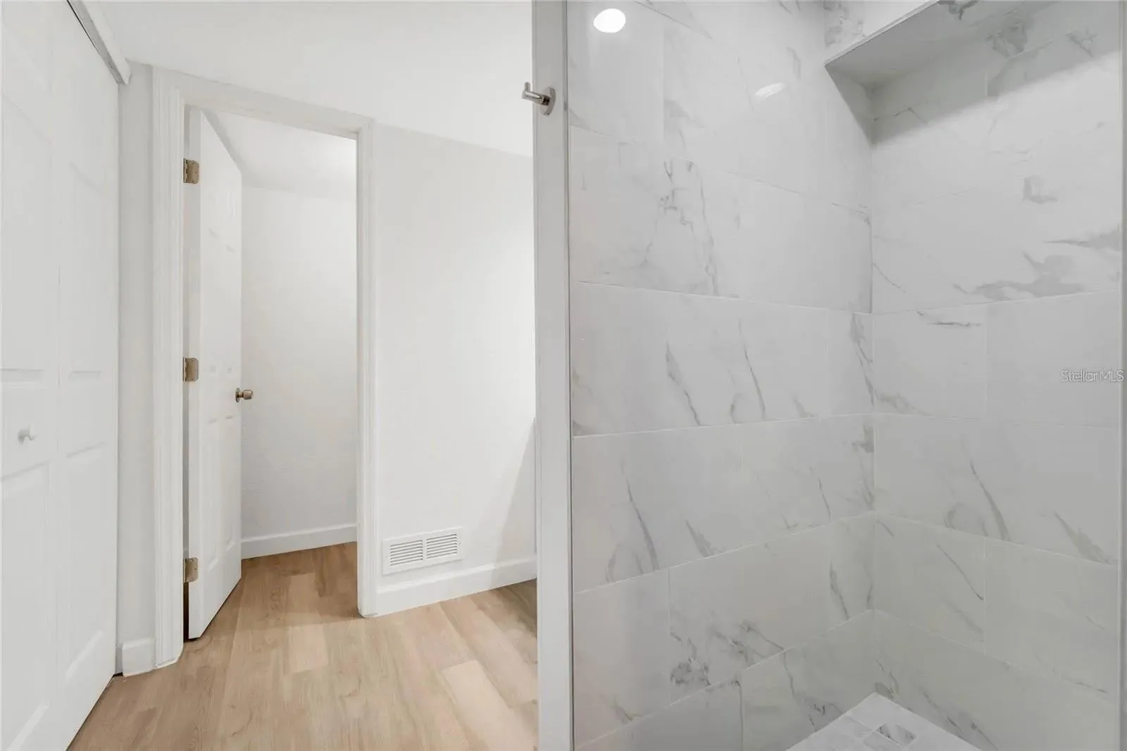 Primary bathroom shower.