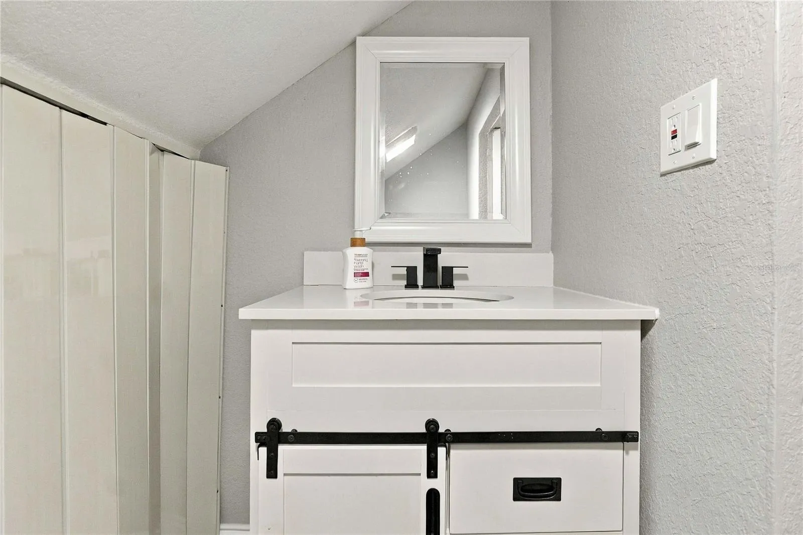 En-suite half bathroom upstairs