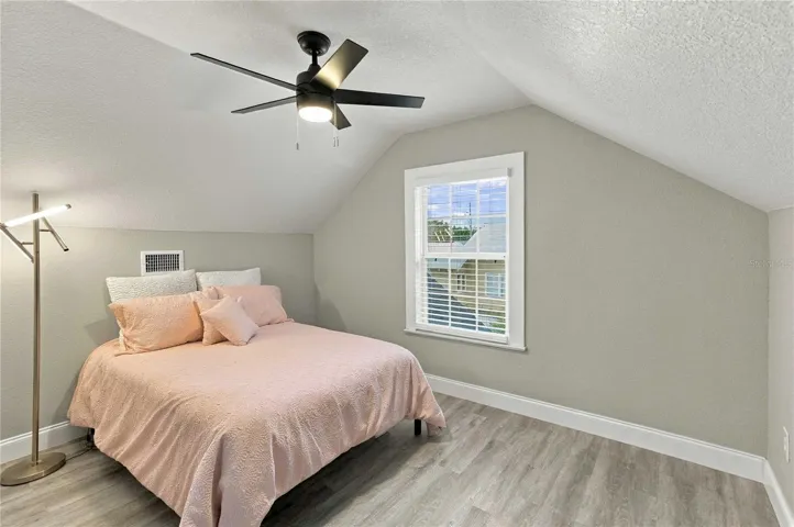 Upstairs bedroom with en-suite half bath