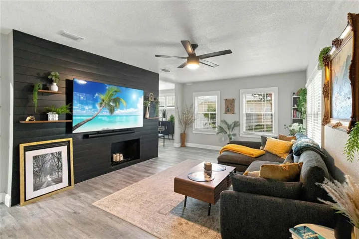 Spacious living room with fireplace.