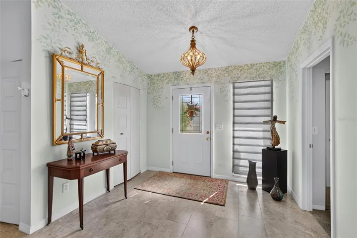 Inviting foyer, coat closet