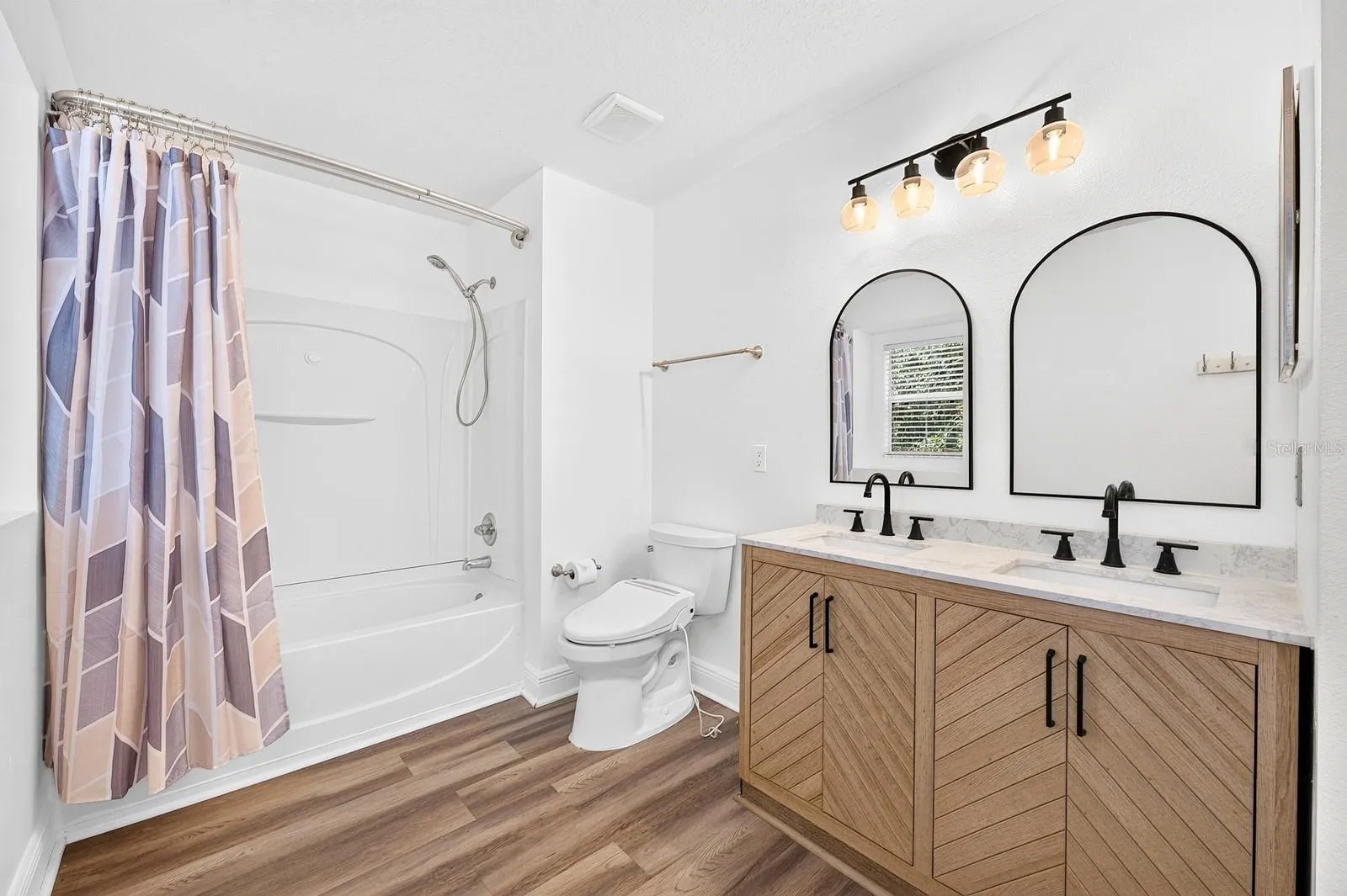 Two additional Bedrooms and another full Bath complete the second floor, providing comfortable accommodations for family members, guests or additional workspace.