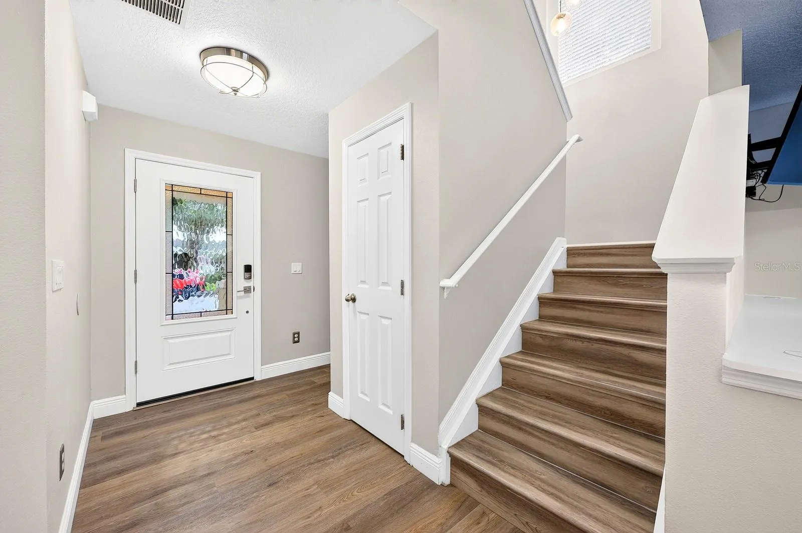 Step inside to discover an inviting open floor plan with LUXURY VINYL PLANK FLOORING throughout.