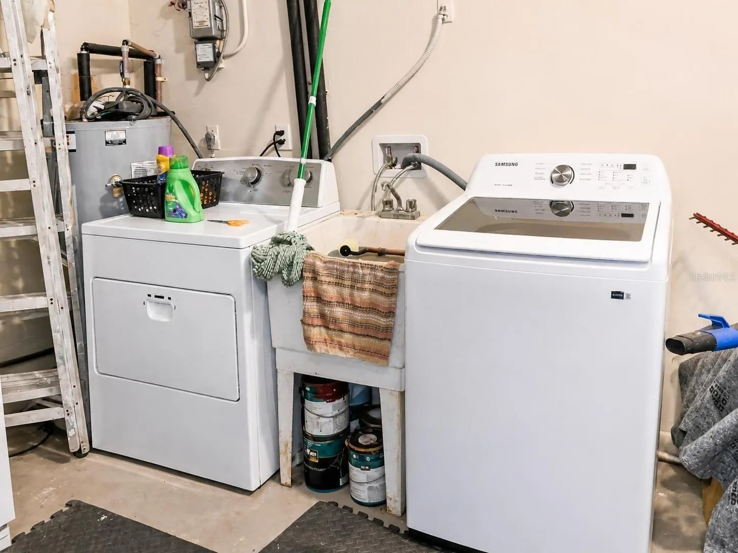 Brand new washer and dryer with utility sink
