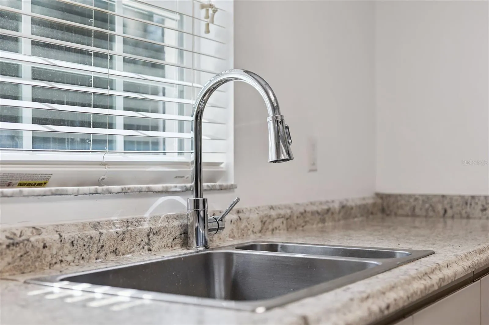 Laminate counters and a modern pull-down faucet