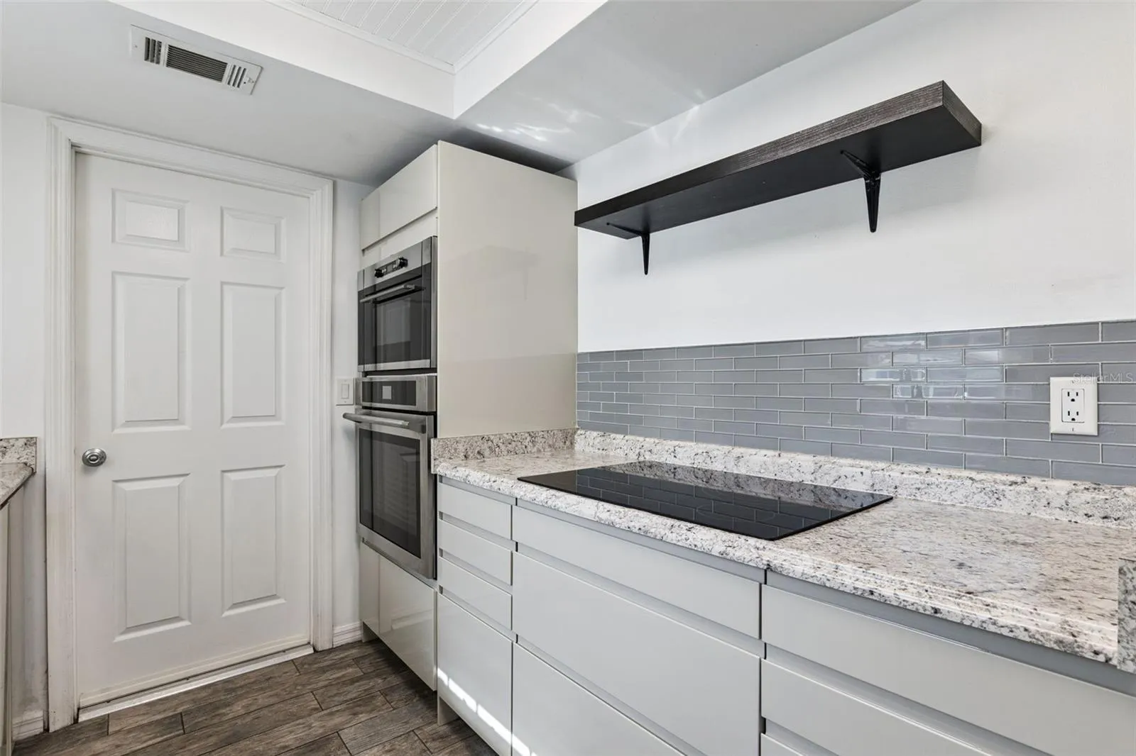 Built-in wall oven and smooth cooktop, a dream setup for the home chef