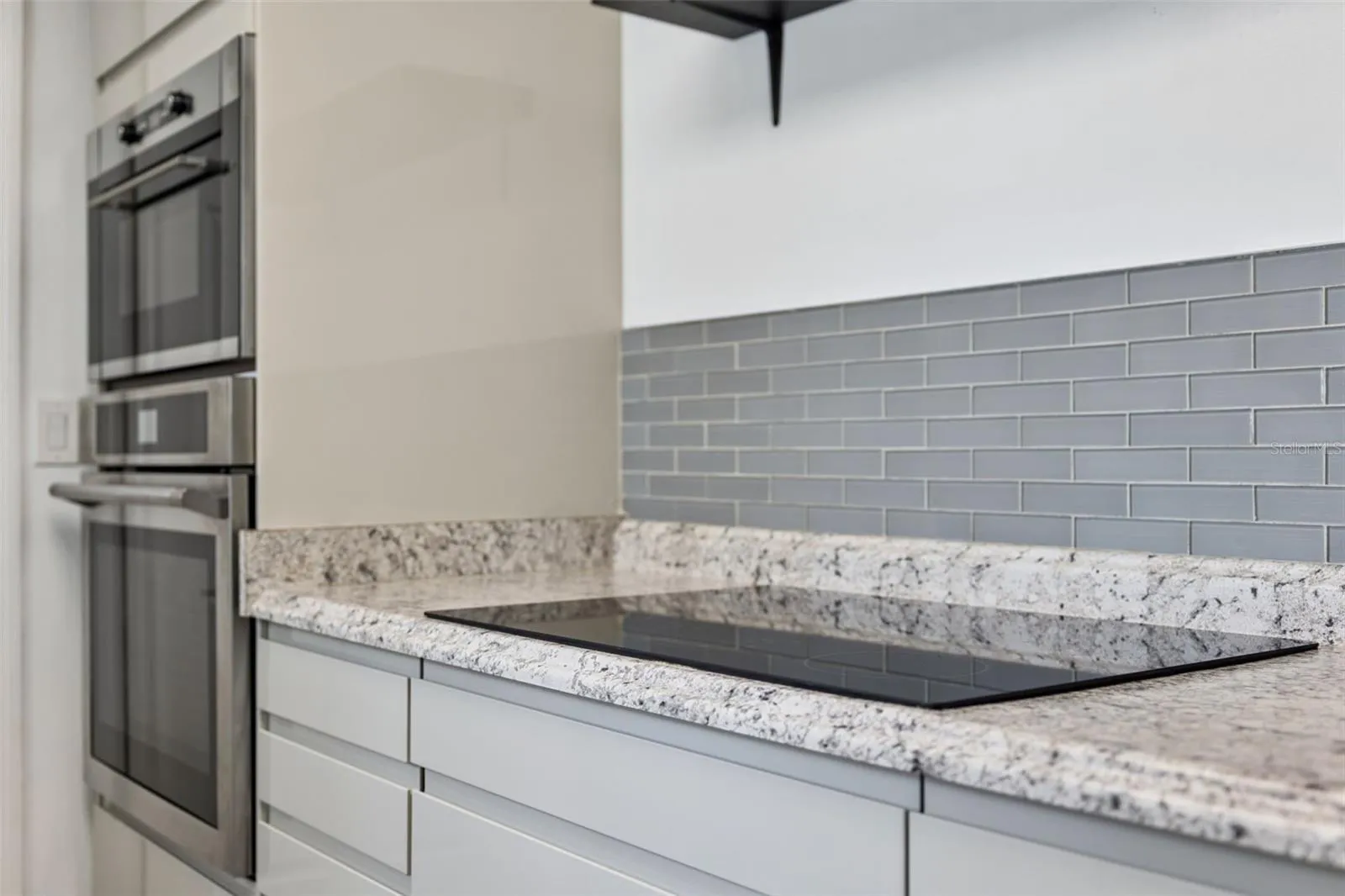 Sleek stainless built-ins add a polished, modern touch