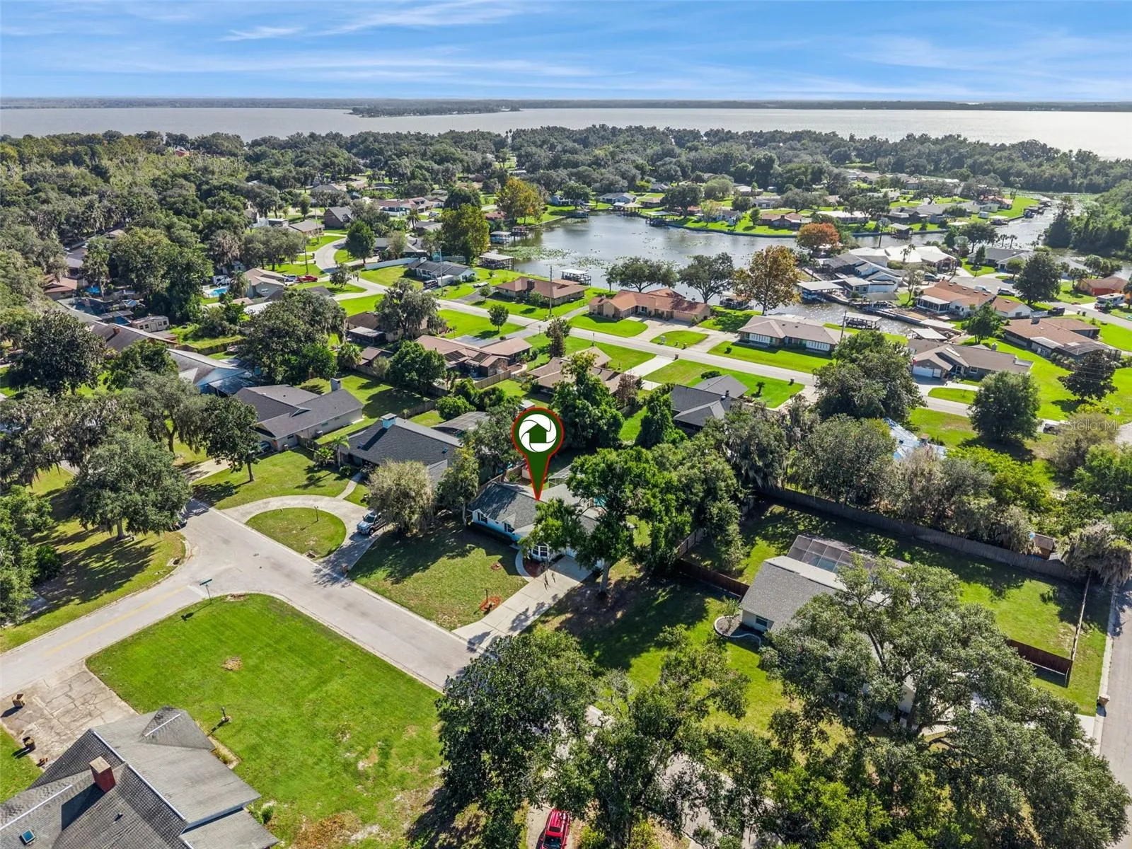 Set in a peaceful Fruitland Park neighborhood, with lake views on the horizon