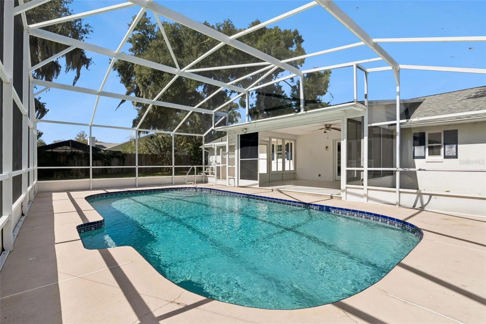 Your own screened pool, ready for sunny Florida afternoons