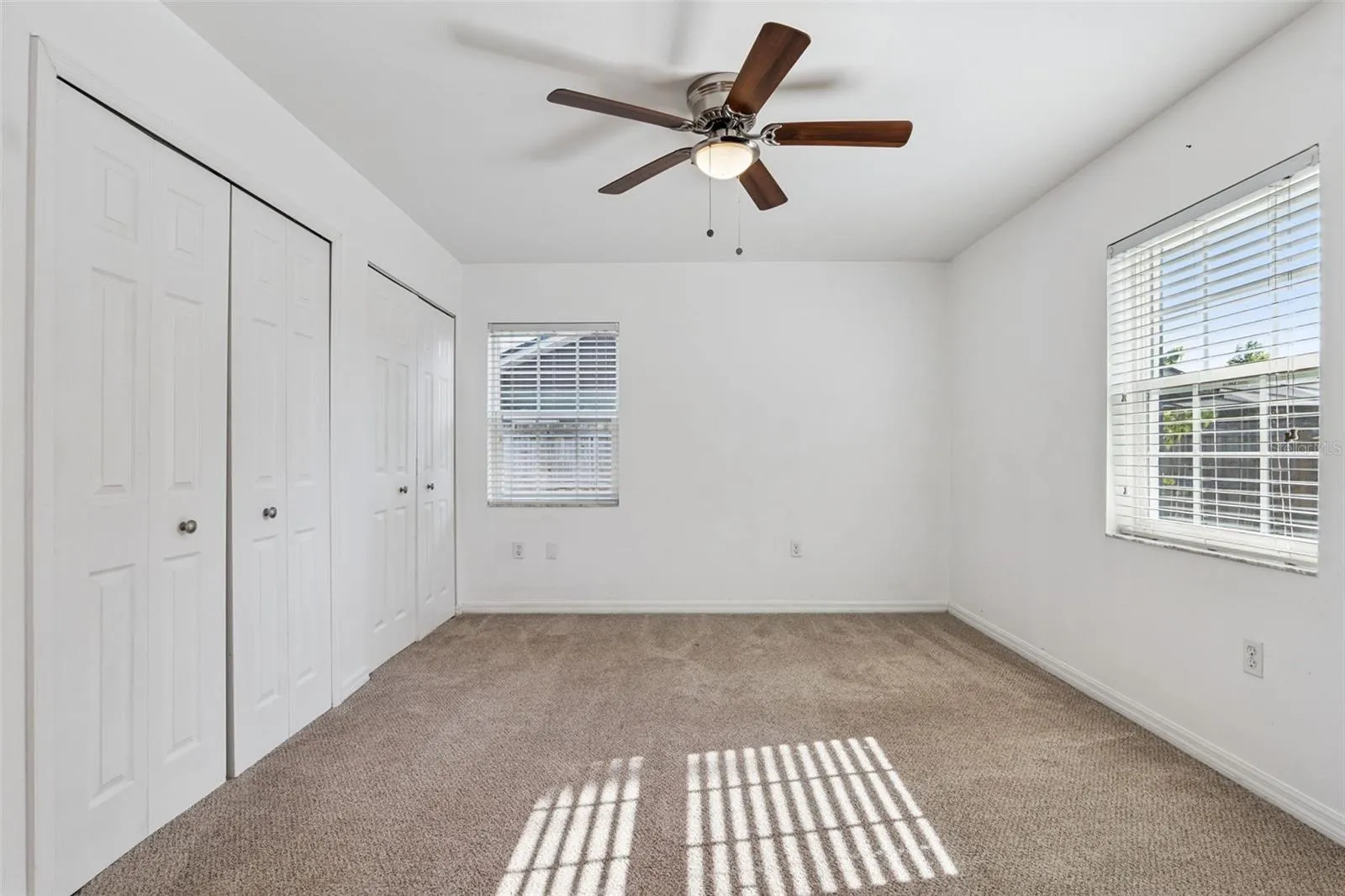 Roomy bedroom with plenty of closet space