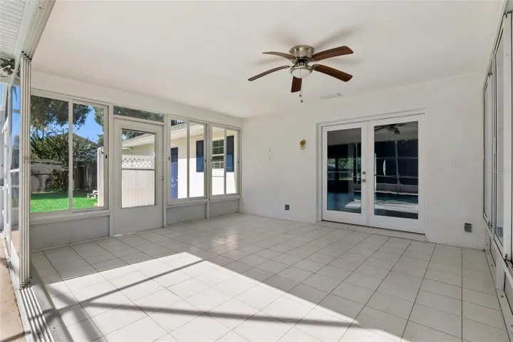 Sunny Florida room with easy-care tile floors