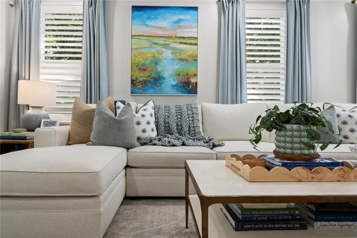 Layered window treatments with shutters and drapery