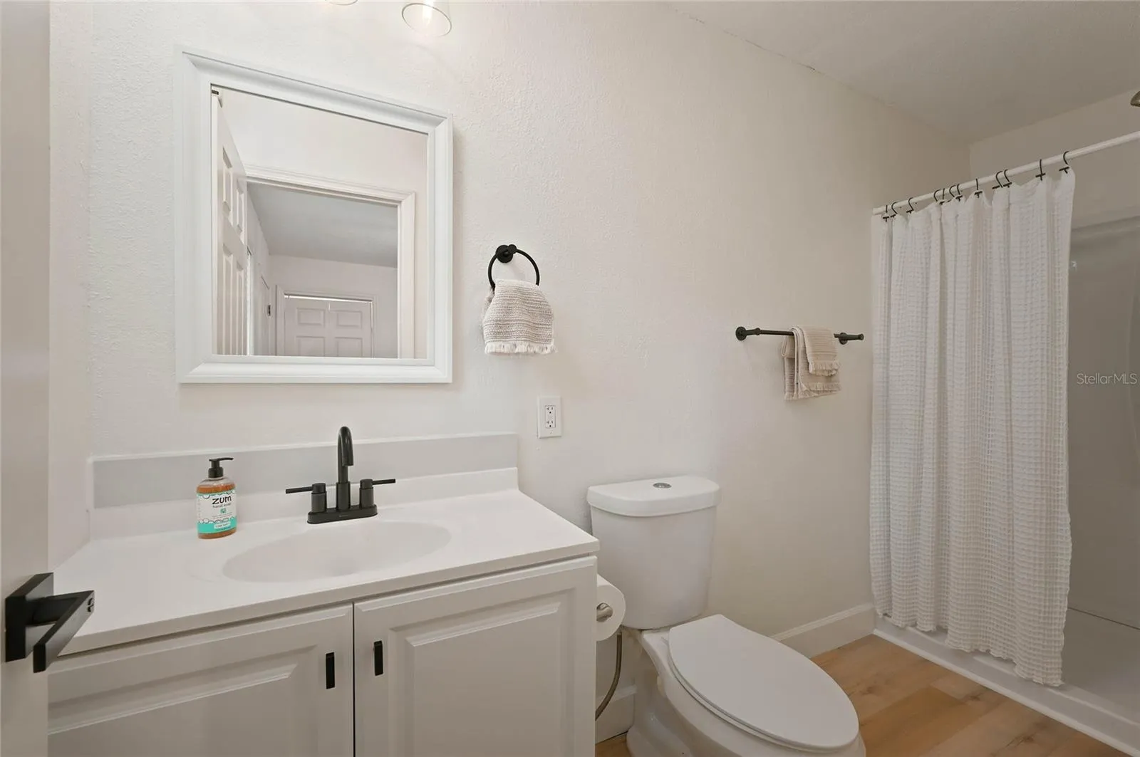 primary bath with nice shower and vanity