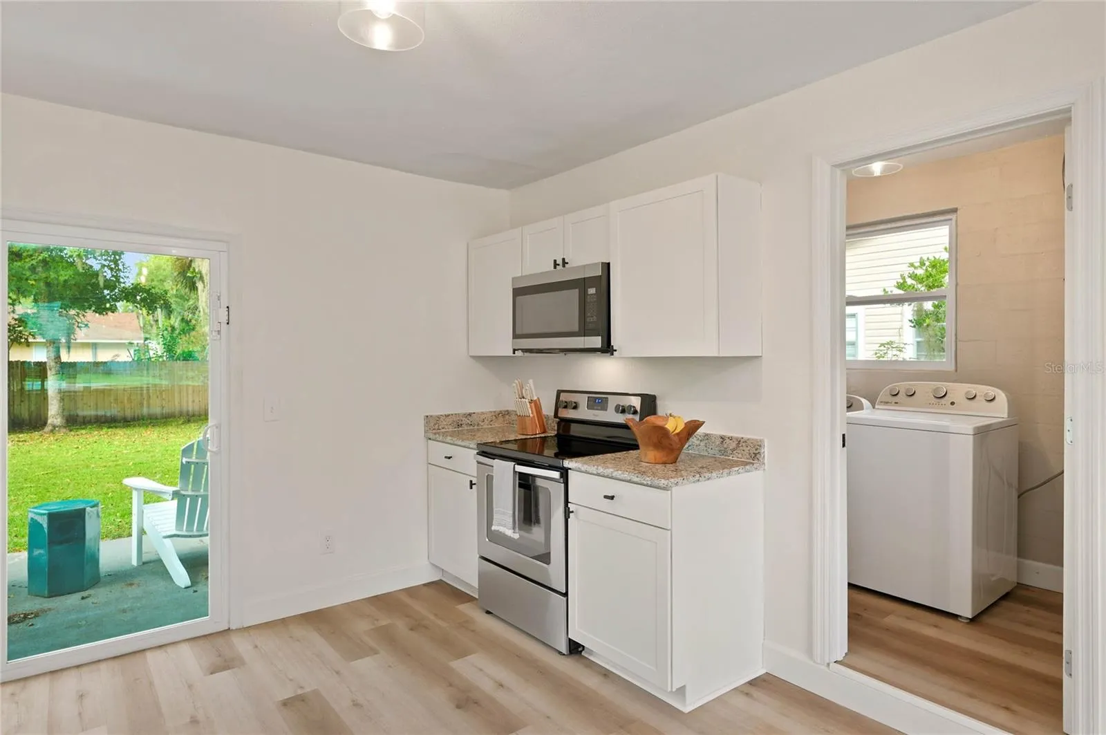 kitchen to laundry and storage space