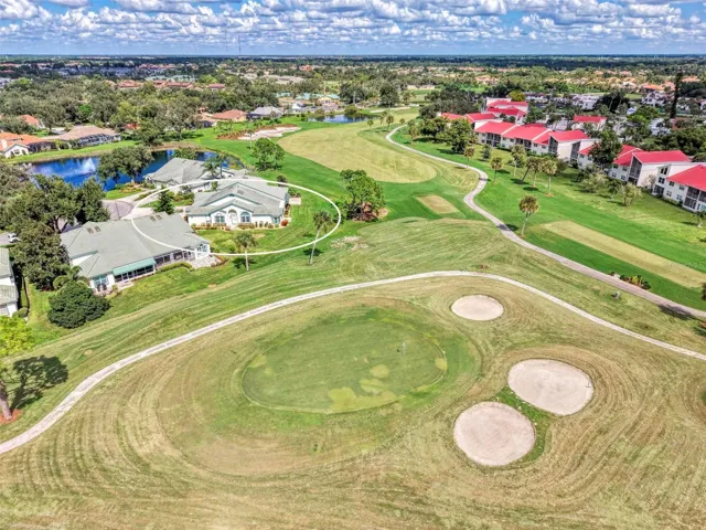 Looking out at 6th Green at Capri Isles Golf Course