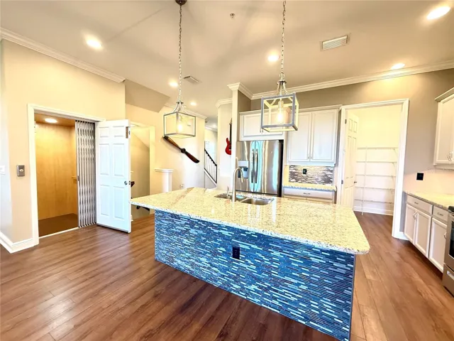 Note the elevator entry from the 4 car garage directly into the kitchen, makes putting groceries away simple!