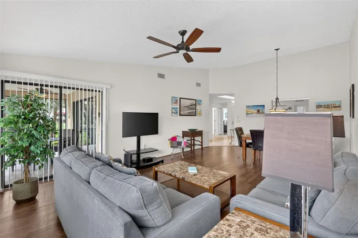 Living Room features sliding doors leading to the lanai