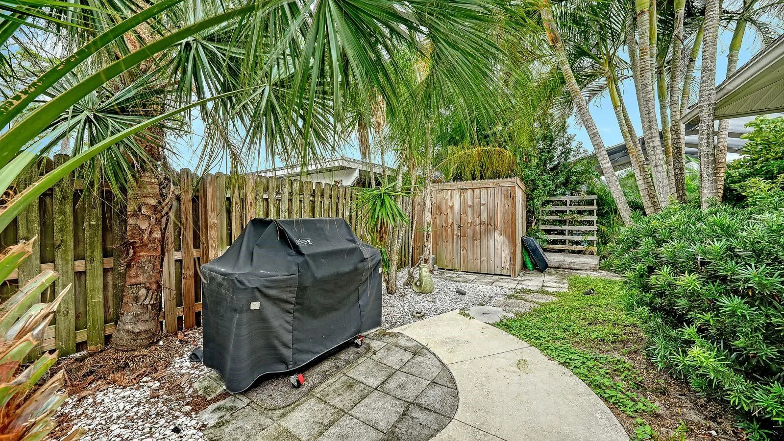 Privacy Fence, Outdoor Grilling Area & a Storage Shed for extra storage and convenience.
